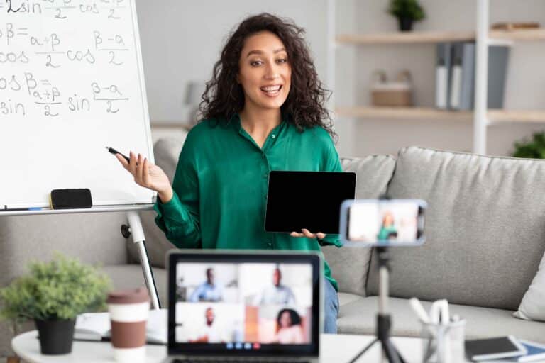female-teacher-explaining-math-online-showing-tabl-2026-03-24-02-22-53-utc